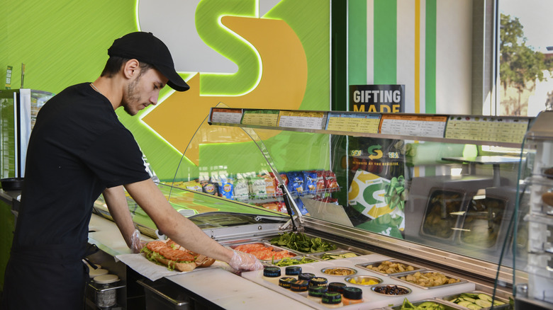 Subway worker making a sandwich