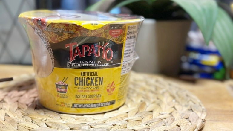 Tapatio Spicy Chicken Flavor Ramen Bowl on wicker mat