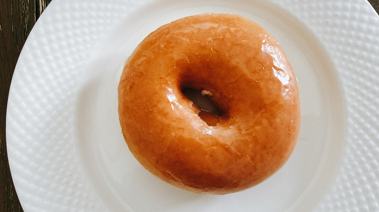 Krispy Kreme Original Glazed Doughnut on white plate