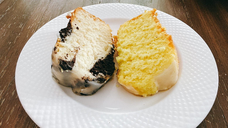 Publix marble and lemon creme cakes on white plate on wooden table