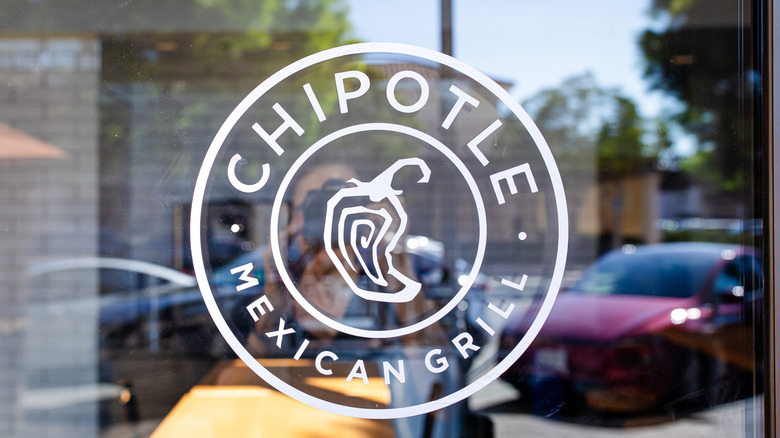 A reflective window at a Chipotle Mexican Grill