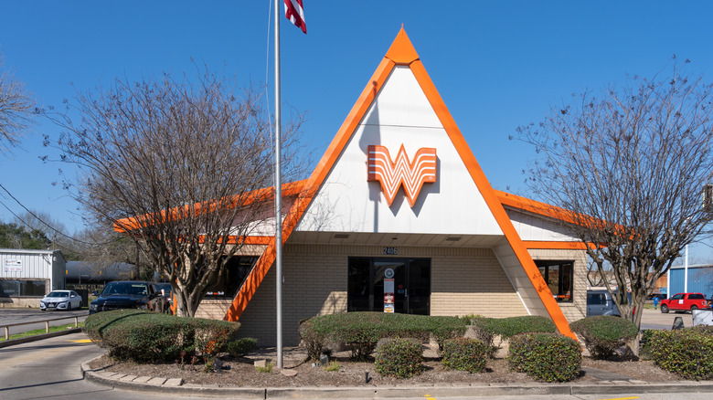 The exterior of a Whataburger, day