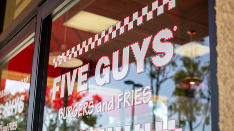 Exterior of a Five Guys restaurant