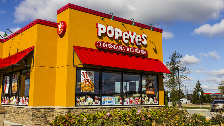Exterior of a Popeyes restaurant during the day