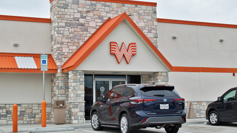 Exterior of a Whataburger, day, car parked in front of it