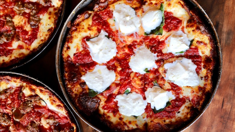 Overhead view of Labriola Chicago deep dish pizzas on a table