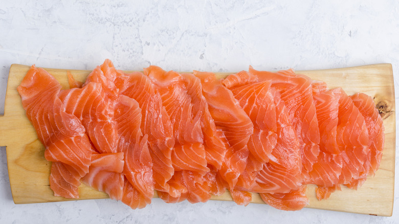 Smoked salmon on a wooden board