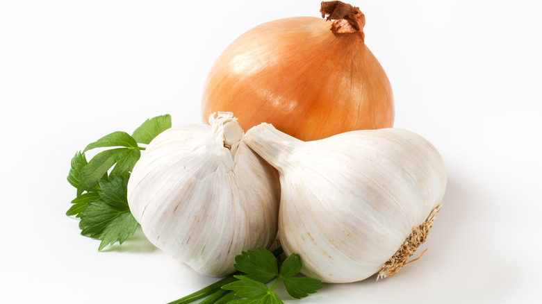 Garlic and onion on a white background