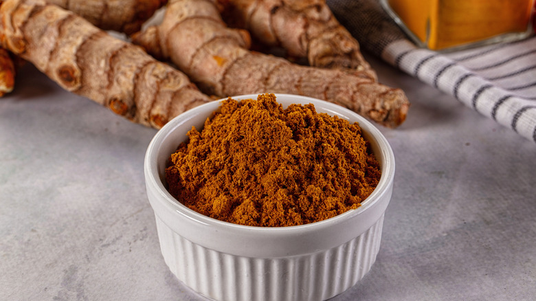 Curry powder in a small white ramekin