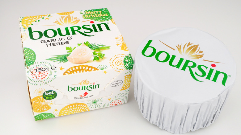 Boursin garlic and herb full fat soft creamy cheese in a festive pack