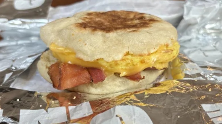 A Sheetz breakfast sandwich sits on a wrapper