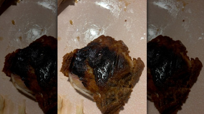 A burnt piece of chicken that a KFC customer received