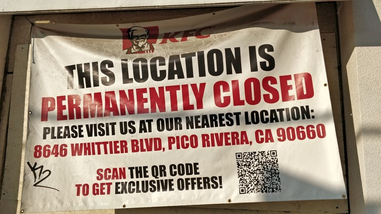 A permanently closed sign outside of a KFC
