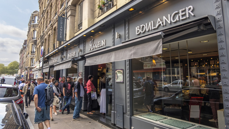 A famous confectionery in Rouen with people lined up for fresh pastries