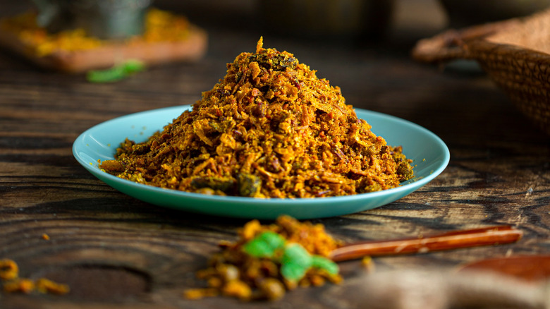 Yemeni spice blend on a blue plate