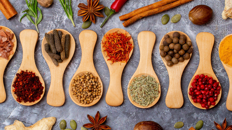 Different spices on spoons