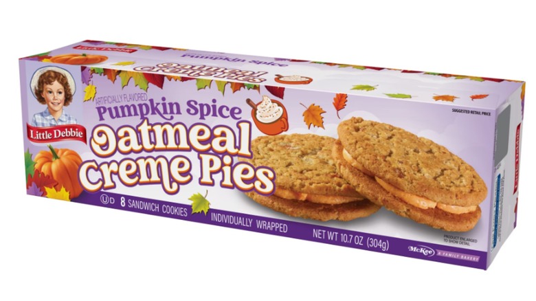 A product image of Little Debbie Pumpkin Spice Oatmeal Creme Pies on a white background.