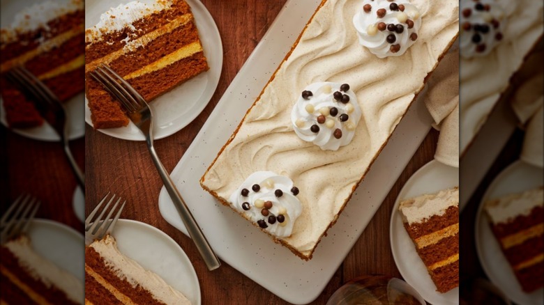 Pumpkin Spice Latte Bar Cake from Sam's Club on a serving platter with several slices on smaller plates.