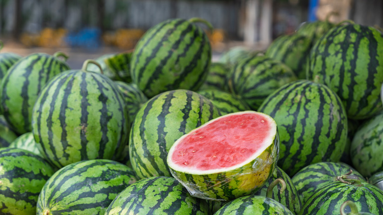 A pile of large watermelons