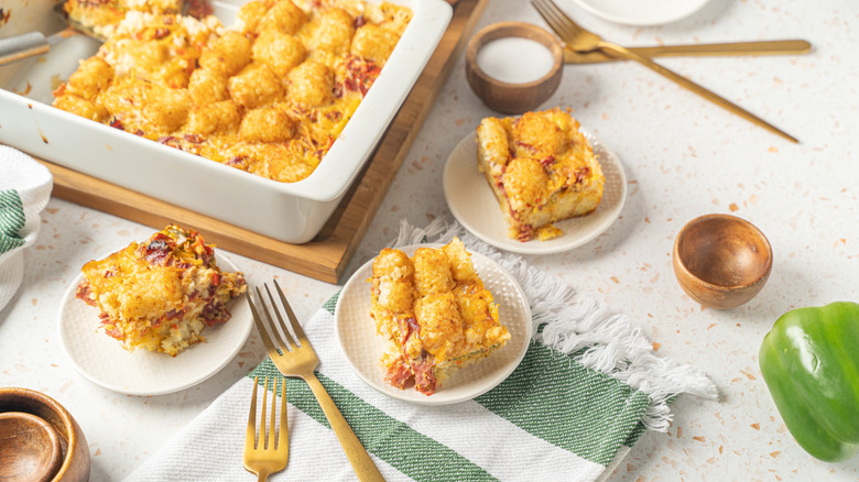 Tater tot casserole in a white dish