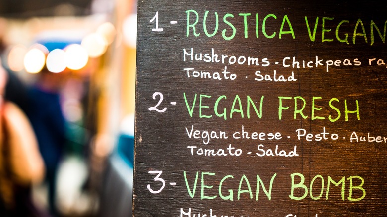 Close up image depicting menu options for a vegan and vegetarian cafe