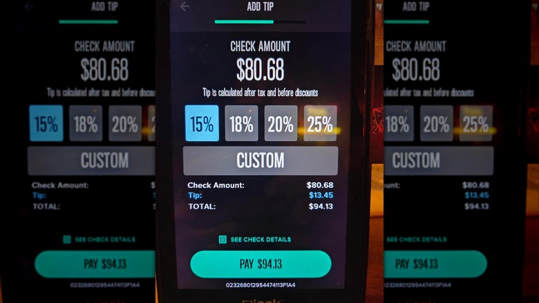 A tipping screen from Texas Roadhouse, mirrored