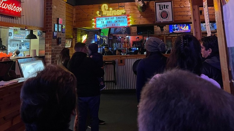 People waiting at a Texas Roadhouse