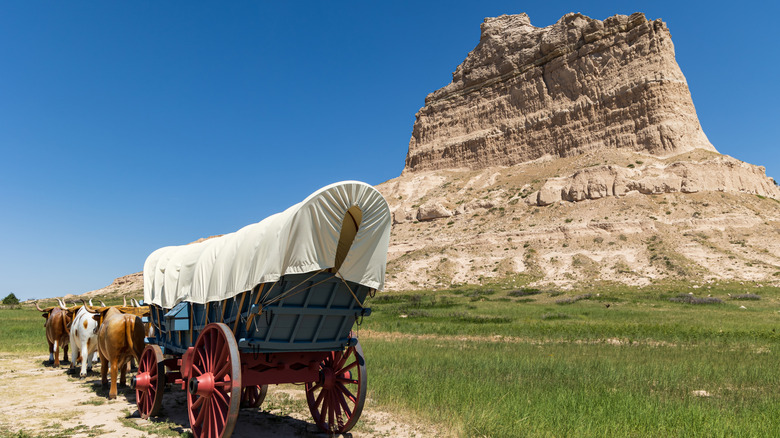 A 19th Century wagon in front of Scott's Bluff, Nebraska
