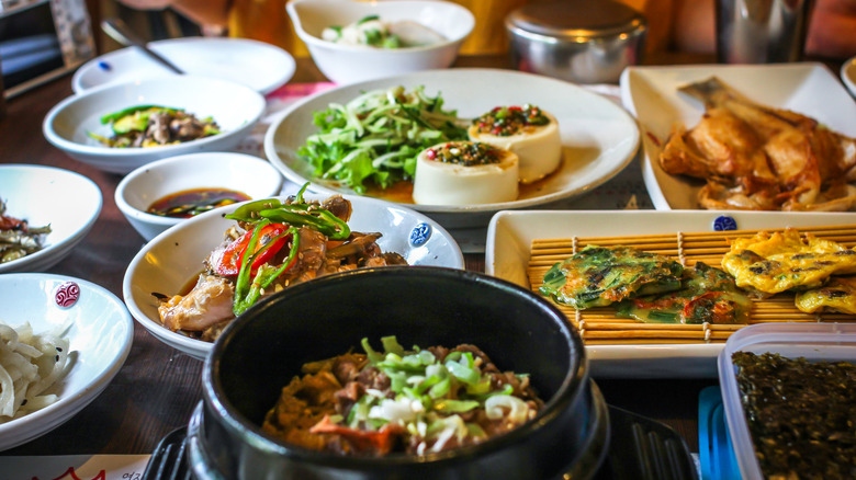 Table with plates of Korean food