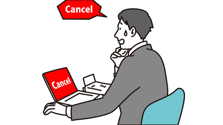A graphic of a man sweating nervously while on the phone, the word "cancel" on his laptop and in a speech bubble above