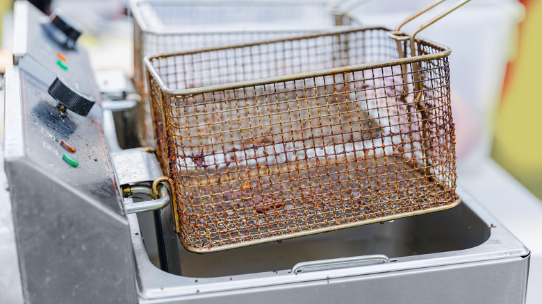 Rusty and dirty fryer basket