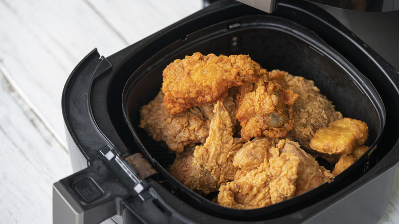 Air fryer filled with chicken