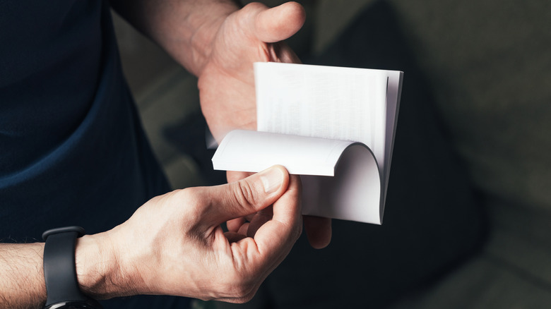 Person reading a user manual