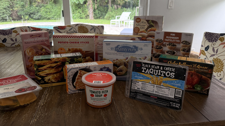 Assorted Trader Joe's appetizers on wooden table