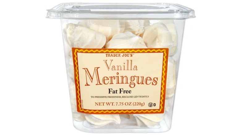 Plastic container of vanilla meringues from Trader Joe's on white background