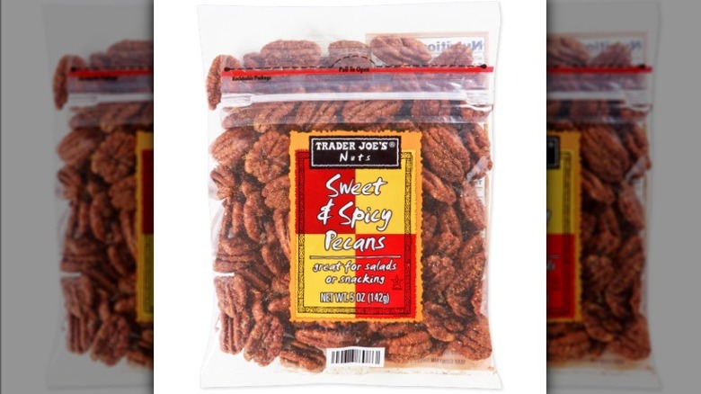 Bag of Trader Joe's Sweet and Spicy Pecans on white background