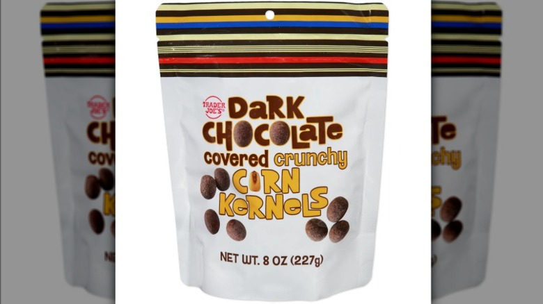 Bag of Trader Joe's Dark Chocolate Covered Crunchy Corn Kernels on white background