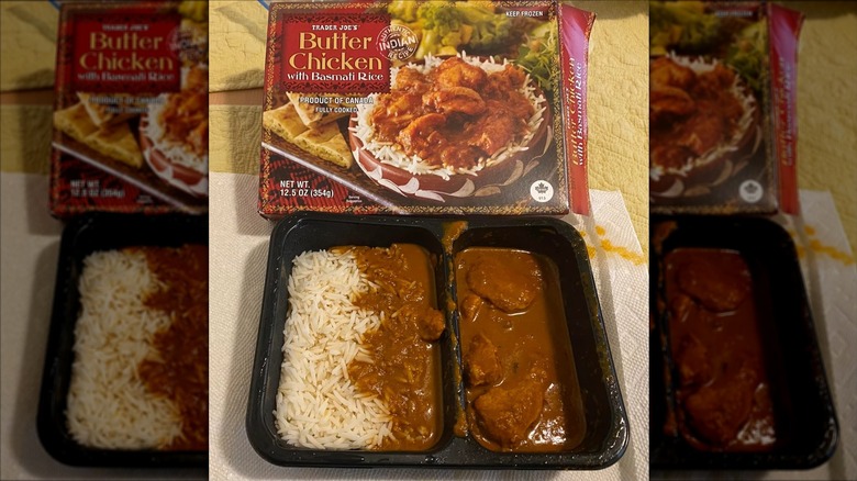 Trader Joe's butter chicken box behind the prepared meal