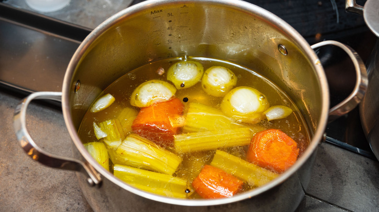 Pot of stock with vegetables