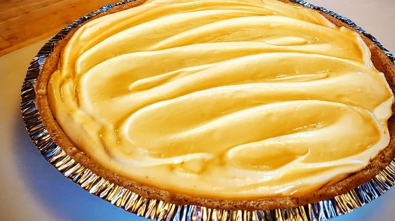 Closeup of Tang pie in aluminum pie dish