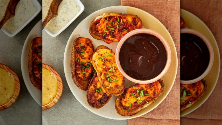 plate of Great Value potato skins with a bowl of barbecue sauce
