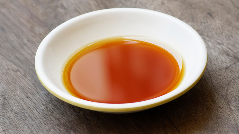 Fish sauce in a white bowl