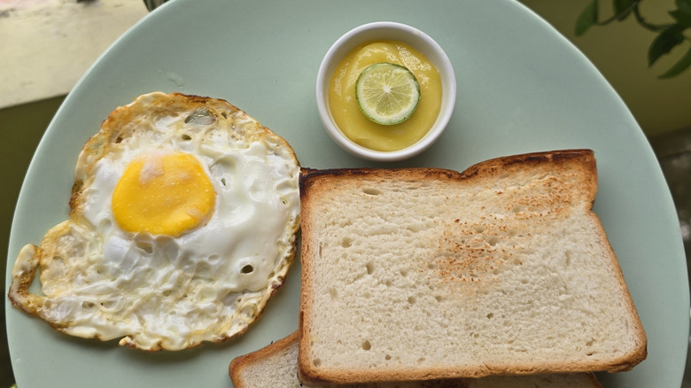Lemon curd with toast and a fried egg