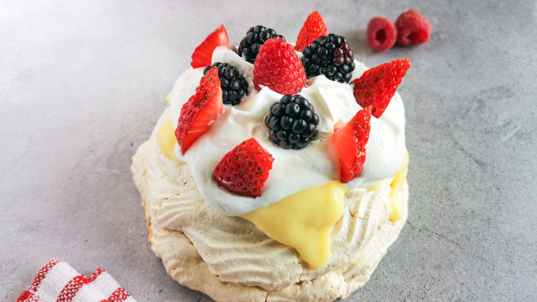 Lemon curd, whipped cream, and fresh berry topping