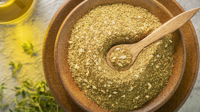 Bowls of seasonings on a wooden board