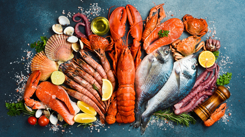 Assorted fresh seafood laid out on a counter