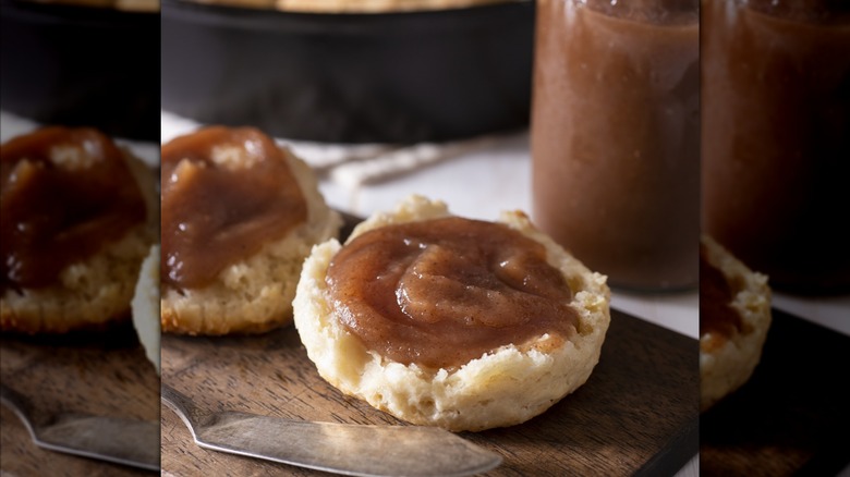 Apple butter spread on biscuits