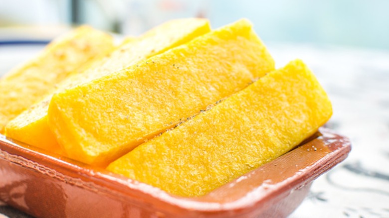 Cornmeal mush slices closeup