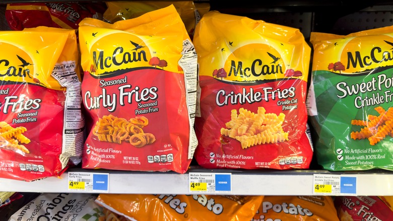 frozen fries in bags on shelf