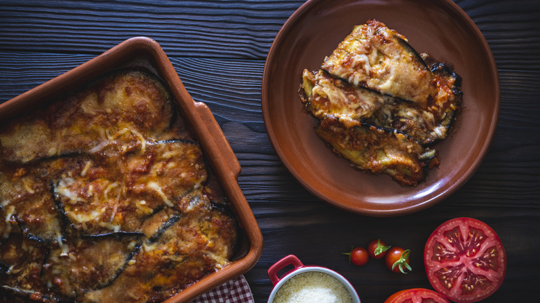 Aubergine Parmigiana italian vegetarian recipe with parmesan cheese and ingredients